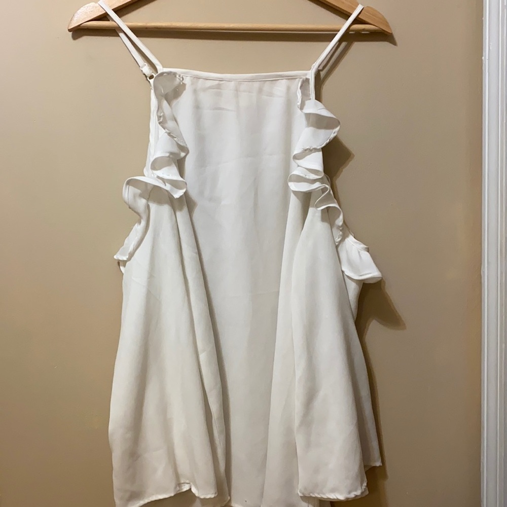 White flowy bell sleeve top with cut out shoulders